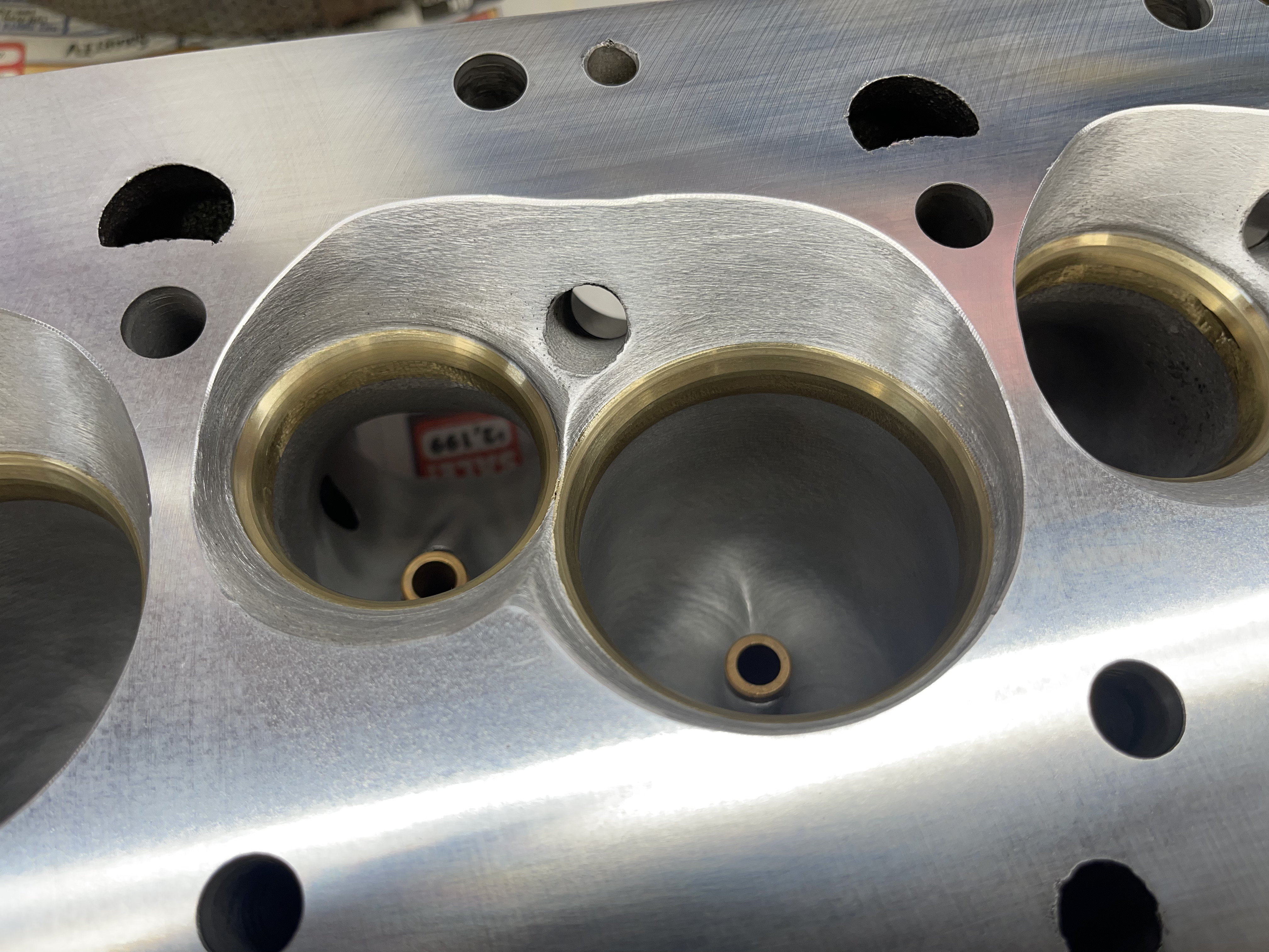 Small block Chevy cylinder heads on the bench